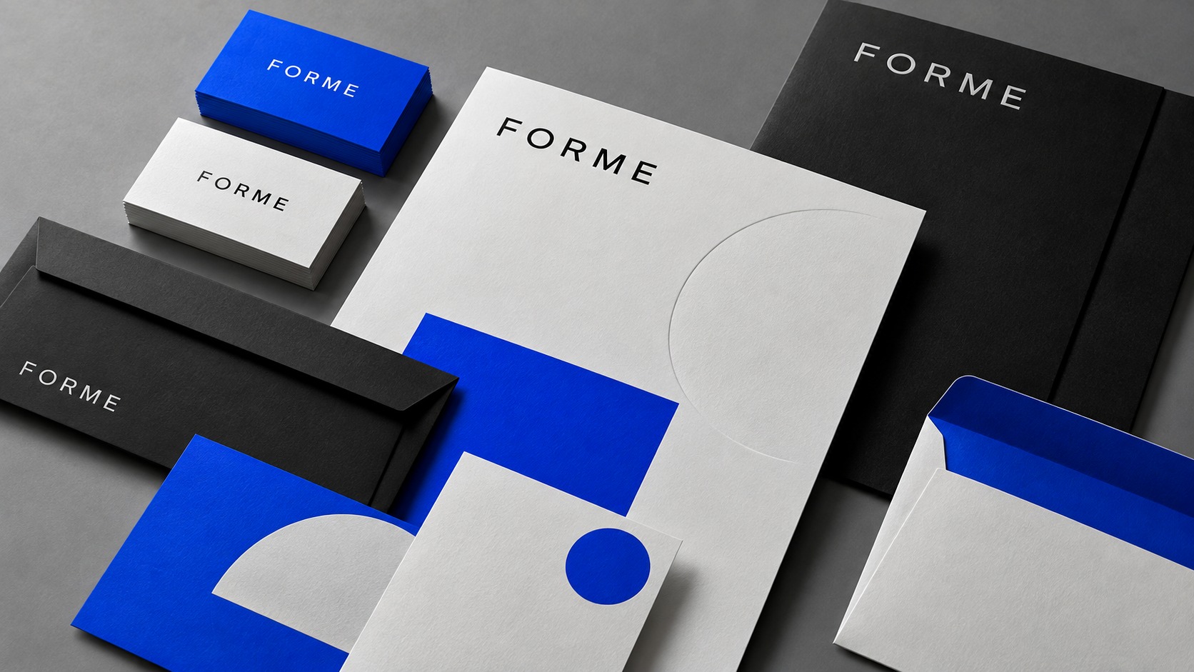 FORME concept brand stationery with cobalt blue and black typography